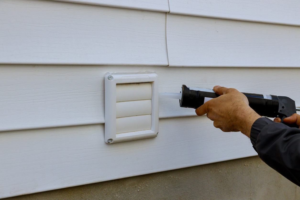Laundry the white frame of a exhaust fan dryer fans