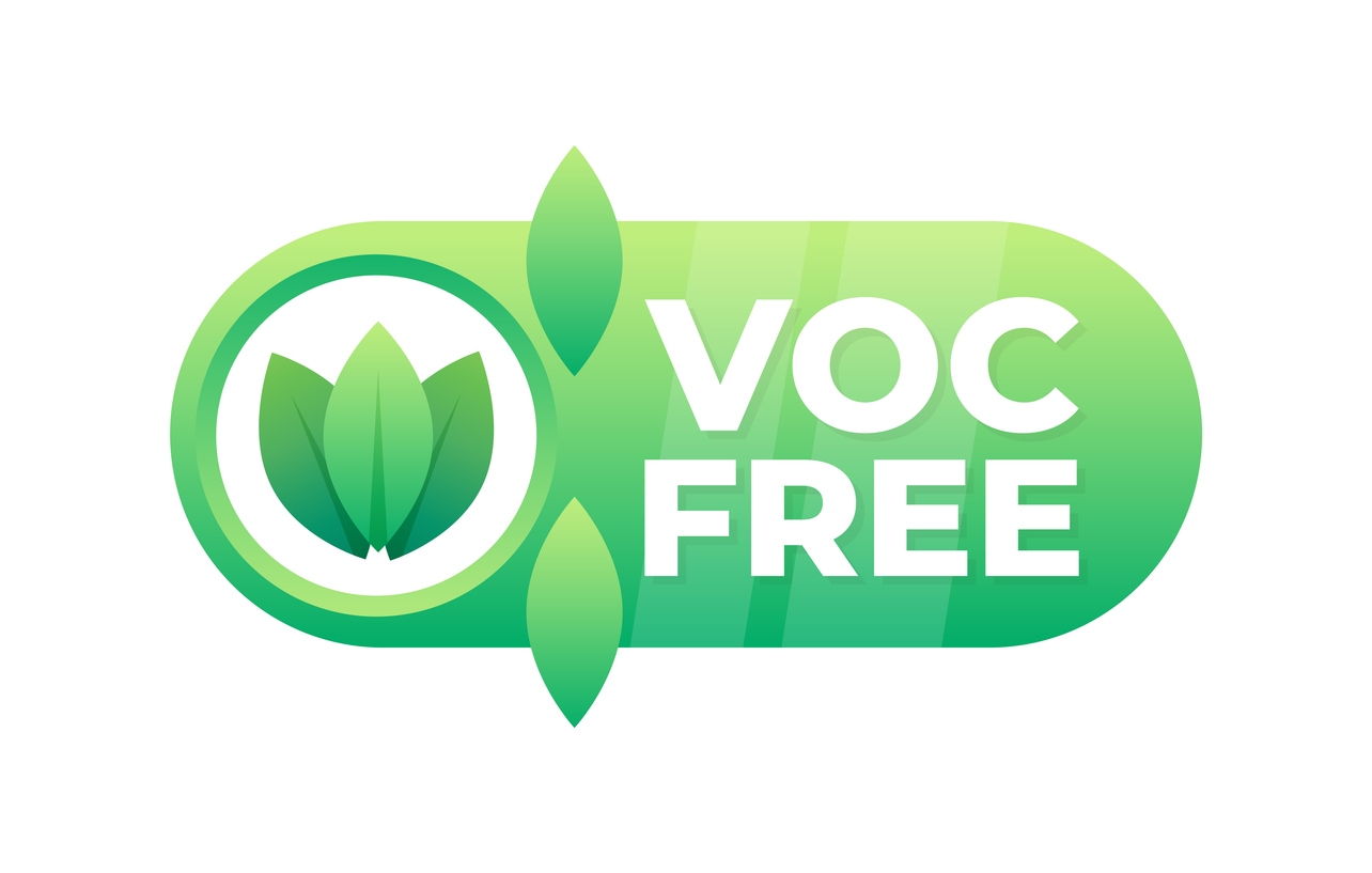 Green label with a leaf motif for VOC Free products, representing no volatile organic compounds used