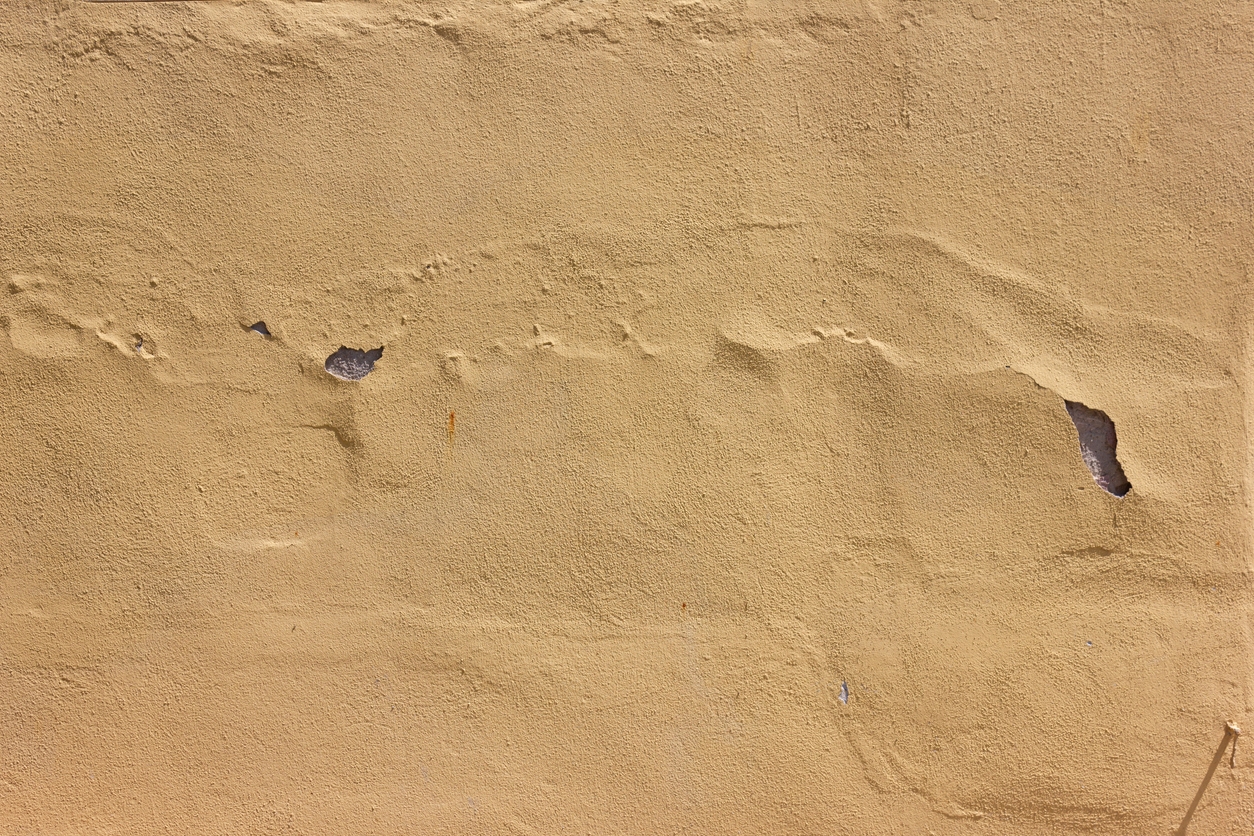 close look at wall of historical building facade at summer